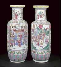 19th century A pair of famille rose rouleau vases